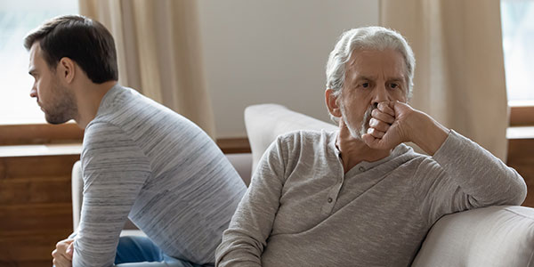 Elderly veteran with his son